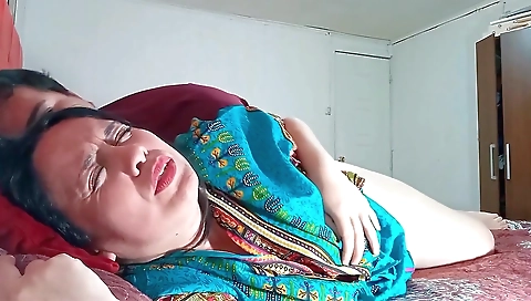 Indian Stepmother Shares Bed With Her Stepson, They End Up Fucking Hard